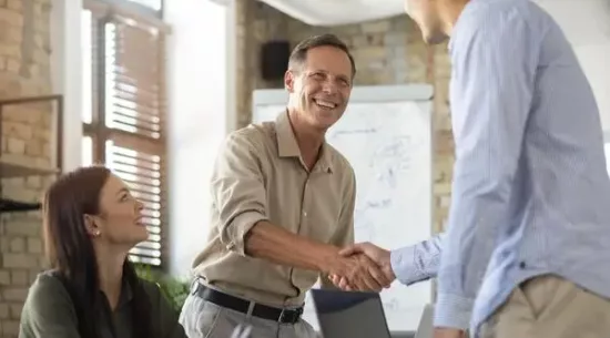 close-up-smiling-person-conference-room-1