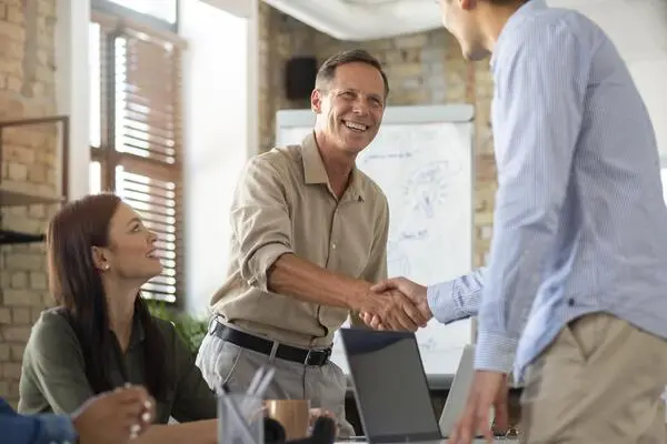 close-up-smiling-person-conference-room-1